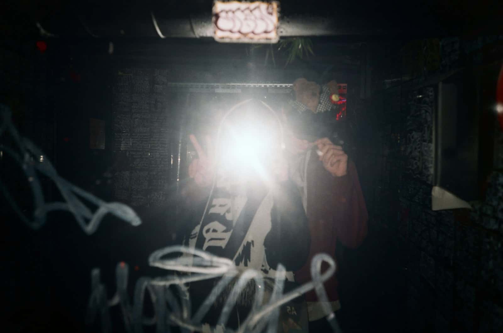 Camera flash burst in a dark room